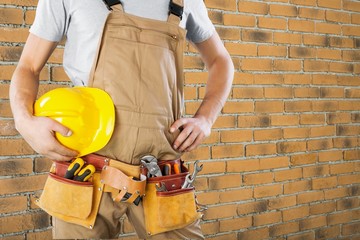 Repairman, closeup, clothing.