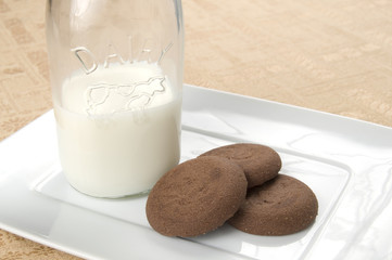 Cookies and Milk in an Antique Dairy Bottle