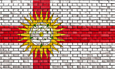 flag of West Riding of Yorkshire painted on brick wall