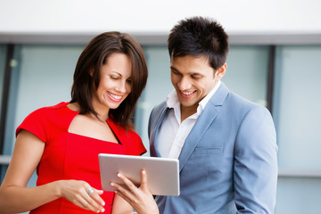 Two young business collegue in office