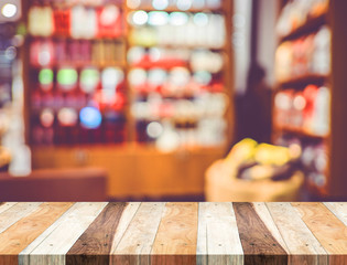Empty wood table and blurred cafe light background. product disp