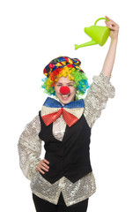 Female clown with watering can isolated on white