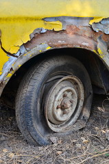 Detail Shot of a Flat Tire on a Car