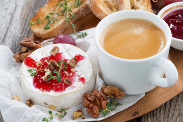 gourmet breakfast- camembert with berry jam, toast, coffee 
