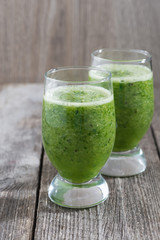 Green fruit and vegetable smoothies, vertical