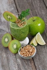healthy fruit and vegetable smoothie with sprouts, top view