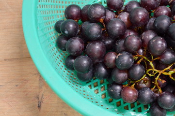 red grape in basket
