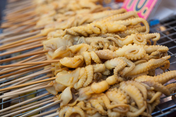 Squid ready for barbecuing in Bangkok, Thailand market.
