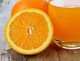 Orange fruit on wooden table background
