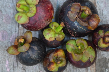 mangosteen on wooden board