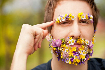 hipster face-covered with flowers thinking