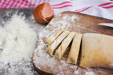 Homemade spaghetti, pasta or noodles on wooden table. 