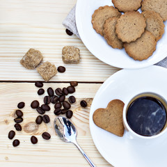 Chocolate cake (eclair) with cup of coffee