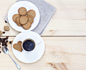 Chocolate cake (eclair) with cup of coffee