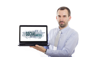 Businessman holding Laptop with Social Media concept