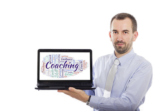 Businessman holding Laptop with Coaching concept