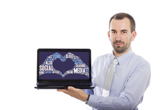 Businessman holding Laptop with Social Media concept
