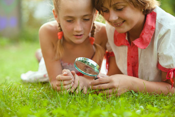 Kid with magnifying glass 