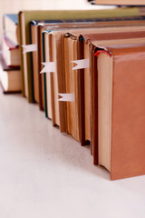Stack of books on table close up
