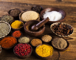 Wooden table of colorful spices