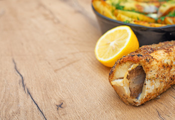 Fried fish and potatoes. Place for your text.