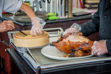 Preparation of a Beijing duck in a chinese restaurant