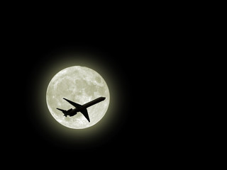 flying airplane across moon