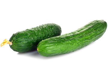 Fresh cucumbers are isolated on a white background