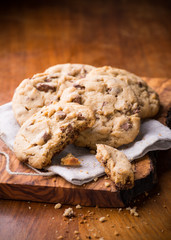 Chocolate chip cookies over olive wood board
