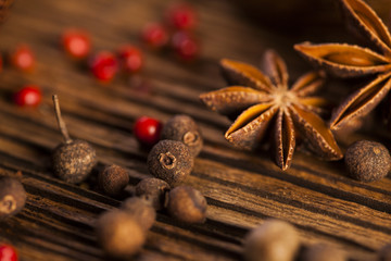 Spices and herbs in wooden bowls