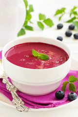 Desert- blueberry soup with cream.
