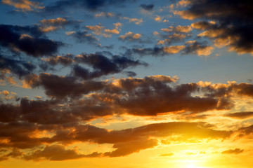 Colorful sky with clouds at sunset. Nature background.