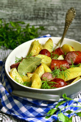 Potato baked with homemade sausage and onion.