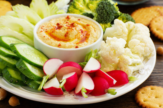 homemade hummus with raw vegetables.