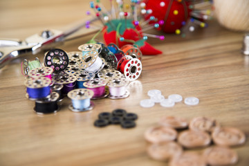 Sewing kit. Scissors, bobbins of thread the needle