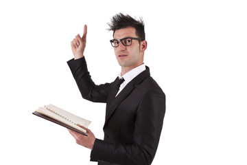 businessman with book pointing