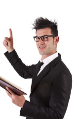 businessman with book pointing