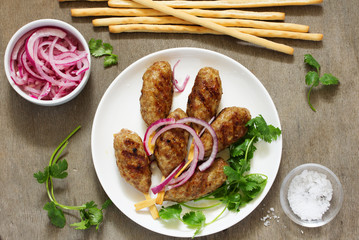 Kyufta (barbecue) of lamb with snacks