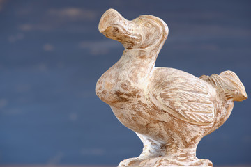 Wooden Dodo bird - typical souvenir from Mauritius island. Dodo is an extinct flightless bird that was endemic to the island of Mauritius. © Dmitry Chulov