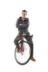 Young Male On Bicycle Isolated Over White Background