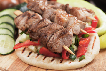 Pita bread and meat skewer