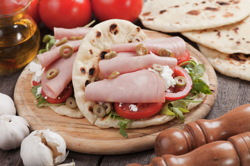 Piadina romagnola, italian flatbread sandwich © Igor Dutina