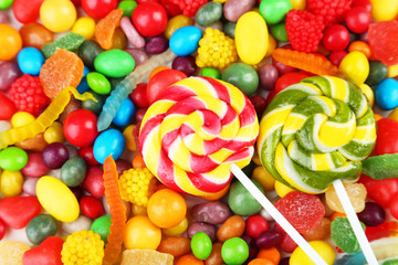 Fototapeta na wymiar Different fruit candies background