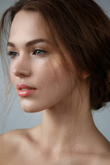 Fototapeta premium Beautiful woman with natural make up and hairstyle