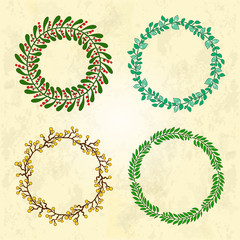 Set of round hand drawn floral frames on vintage background.