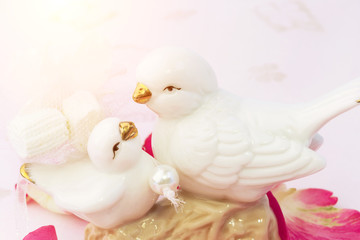 figurines of lovers pair of wedding doves Valentine love tenderness vintage retro selective soft focus