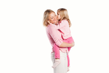 Portrait of happy embracing mother and daughter