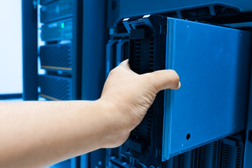 Man fix server network in data center room