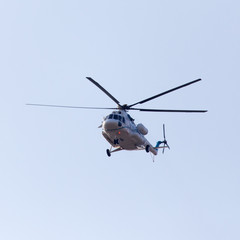 Fototapeta premium helicopter on a blue sky