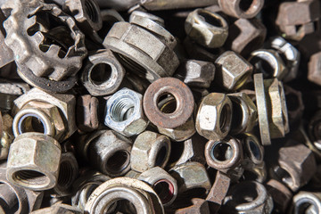 Detail of different metallic bolts and nuts